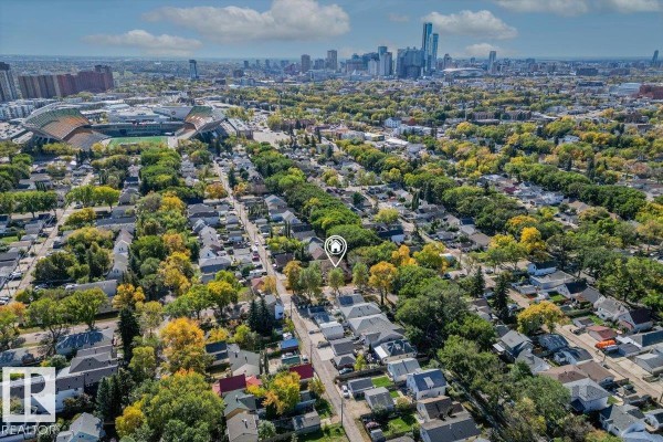 Aerial view of Edmonton cityscape with sports stadium and skyscrapers in the distance. - 11347 89 St Nw, Edmonton