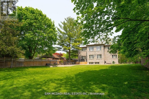 Stone house backyard with gazebo and deck - 1138 Garden Road Mississauga