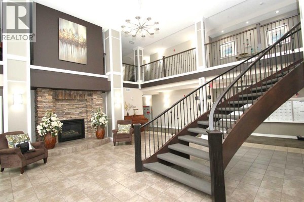Living room - 114, 6 Michener Boulevard, Red Deer, AB T4P0K5 Photo 2