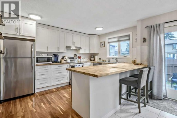 Primary Bedroom - 114, 6103 Madigan Drive Ne, Calgary, AB T2A5K9 Photo 5
