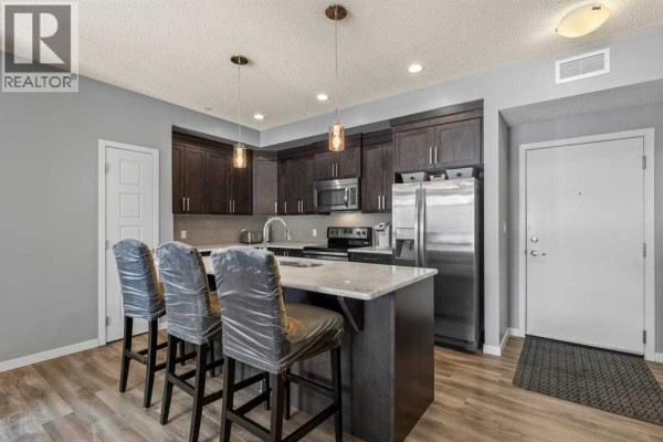 Primary Bedroom - 114, 6703 New Brighton Avenue Se, Calgary, AB T2Z5C8 Photo 4