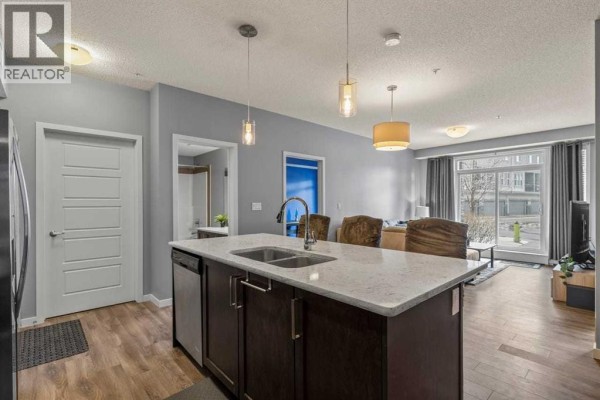 Bedroom - 114, 6703 New Brighton Avenue Se, Calgary, AB T2Z5C8 Photo 5