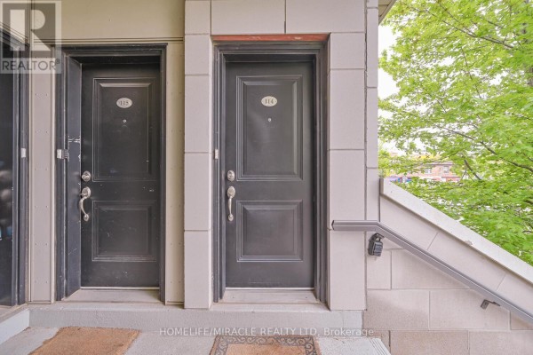Close-up view of two black townhouse doors, numbered 115 and 114. - 114 - 256 Royal York Road, Toronto