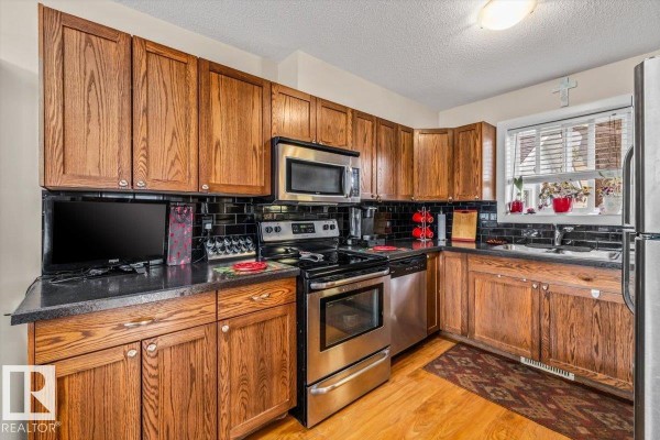 Kitchen - 11436 88 St Nw, Edmonton, AB T5B3R1 Photo 2