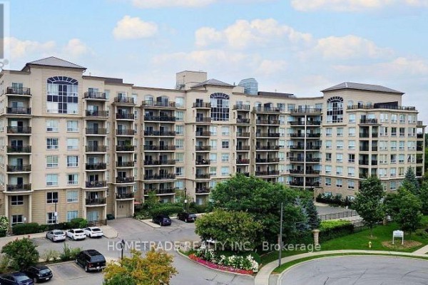 Aerial view of a multi-story apartment building with balconies and surrounding trees. - 115 - 2 Maison Parc Court, Vaughan