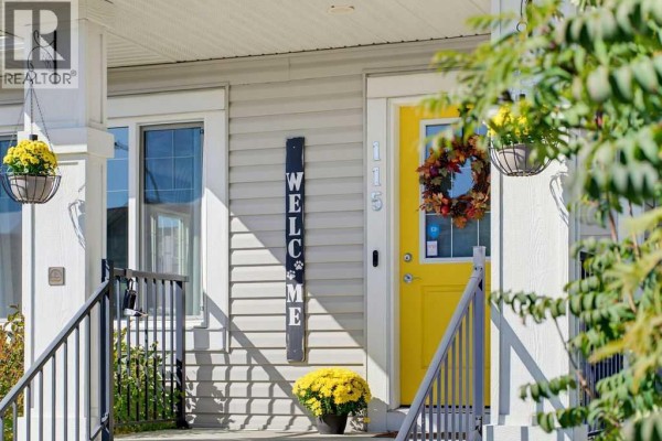 Living room - 115 Heartland Boulevard, Cochrane, AB T4C2R1 Photo 2