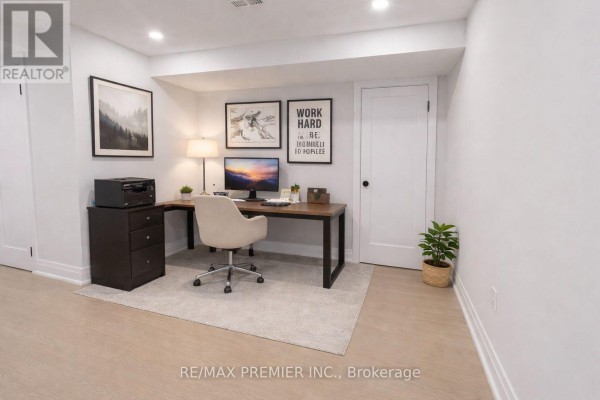 Cozy bedroom with a queen bed, nightstands, and natural light from a window. - 115 Mapes Avenue, Vaughan