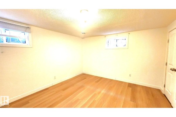 Bedroom 2 - 11516 133a Av Nw, Edmonton, AB T5E1G6 Photo 5