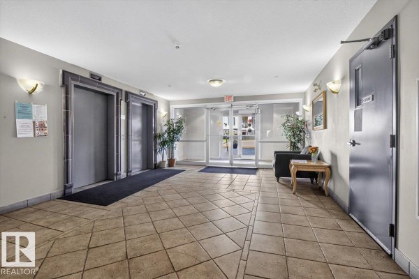 Primary Bedroom - #116 237 Youville Dr E Nw, Edmonton, AB T6L7G2 Photo 3