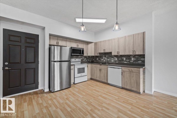 Primary Bedroom - #116 6315 135 Av Nw, Edmonton, AB T5A5J7 Photo 4