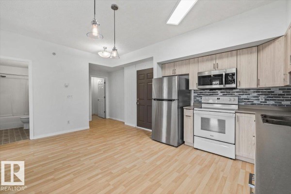 Laundry room - #116 6315 135 Av Nw, Edmonton, AB T5A5J7 Photo 5