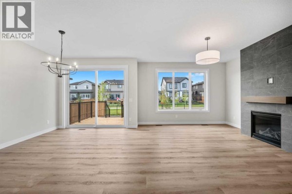 Living room - 116 Quartz Crescent, Cochrane, AB T4C3G2 Photo 5