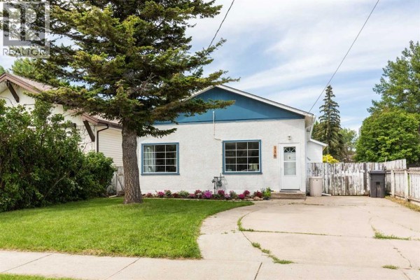 Living room - 116 S 1 Street W, Magrath, AB T0K1J0 Photo 2