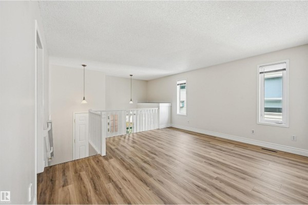 Primary Bedroom - 11615 8 Av Nw, Edmonton, AB T6J6Z8 Photo 5