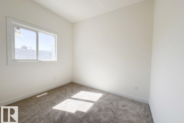 Bedroom 2 - 11642 94 St Nw Nw, Edmonton, AB T5G1H8 Photo 4