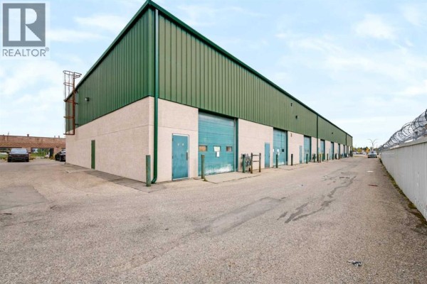Floor plan of a commercial space showing office, washrooms, and warehouse areas. - 117 & 119, 3825 34 Street Ne, Calgary