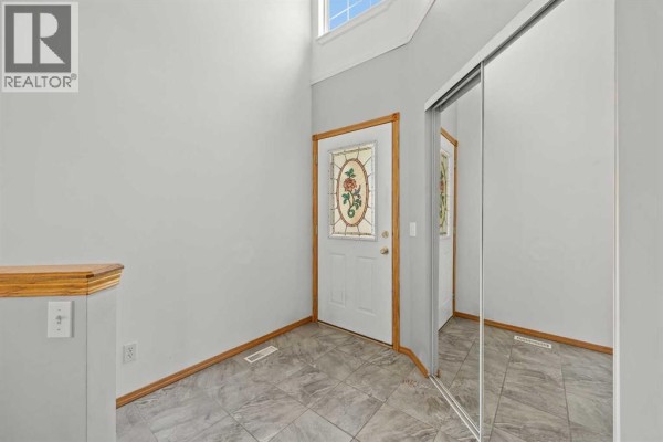 Kitchen - 117 Hidden Spring Circle Nw, Calgary, AB T3A5H4 Photo 3