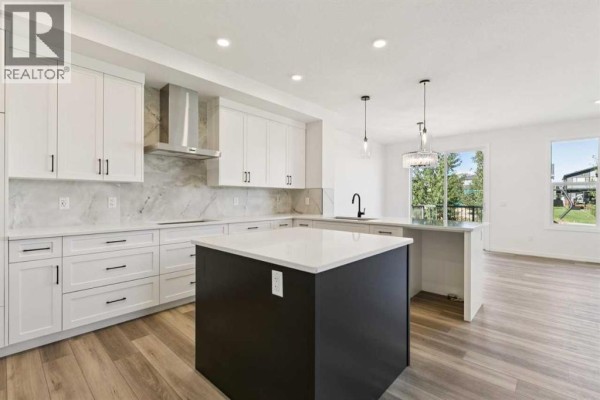 Den - 118 Creekstone Place Sw, Calgary, AB T2X5M8 Photo 4