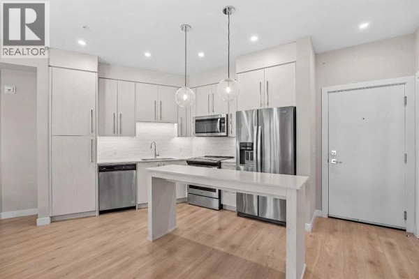 Kitchen - 119, 383 Smith Street Nw, Calgary, AB T3B6J9 Photo 5