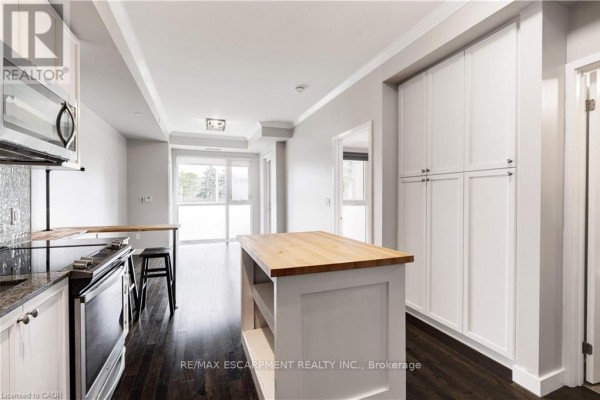 Laundry room - 119 - 168 Sabina Drive, Oakville, ON L6H0W5 Photo 5