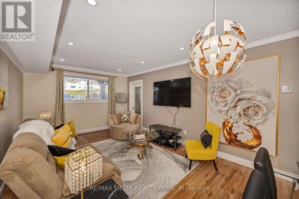 Living room - 119 - 318 Lorry Greenberg Drive, Ottawa, ON K1T2R5 Photo 5