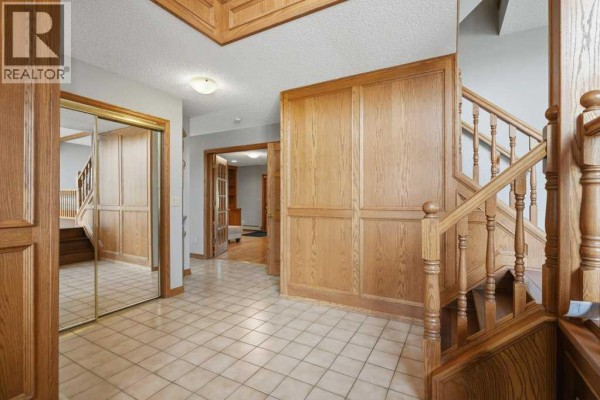 Family room - 119 Strathbury Bay Sw, Calgary, AB T3H1N3 Photo 5