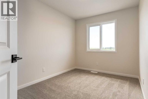 Bedroom - 119 Thomas Street, Crossfield, AB T0M0S0 Photo 5