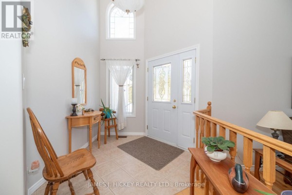Walk-in closet with built-in shelves and drawers, hardwood flooring. - 12 Boudreau Road, Head, Clara And Maria