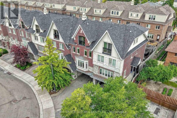 Overhead view of a row of townhouses with landscaped yards. - 12 Gala Lane, Toronto