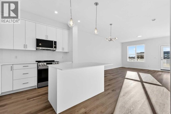 Living room - 12 Hotchkiss Parade Se, Calgary, AB T3S0X5 Photo 3
