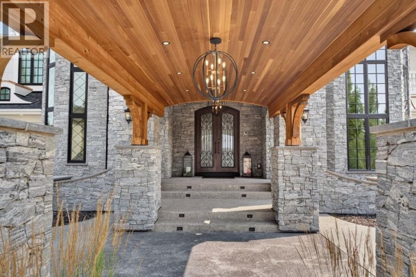 Den - 12 Wycliffe Mews, Rural Rocky View County, AB T3L0C9 Photo 3