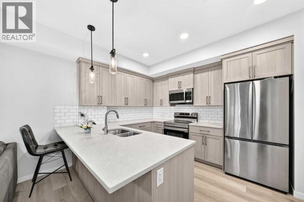 Living room/Dining room - 120, 40 Carrington Plaza Nw, Calgary, AB T3P1X7 Photo 5