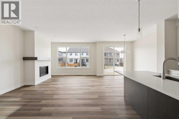 Great room - 120 Creekstone Circle Sw, Calgary, AB T2X5M6 Photo 2