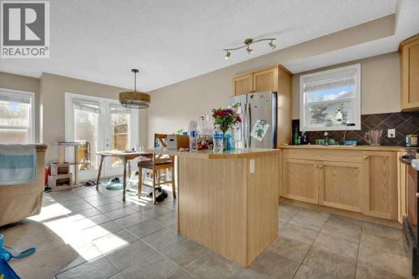 Kitchen - #1201, 2384 Sagewood Gate Sw, Airdrie, AB T4B0K7 Photo 4
