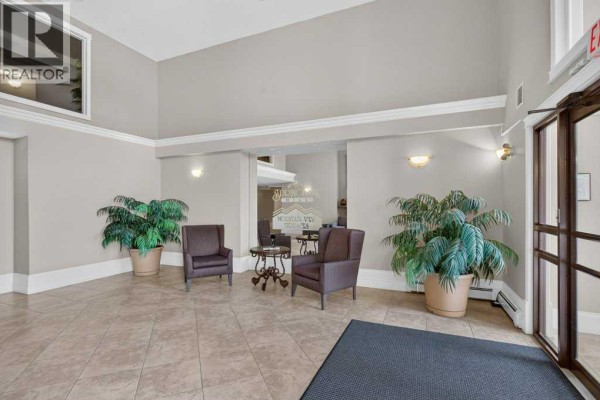 Foyer - 1202, 7451 Springbank Boulevard Sw, Calgary, AB T3H4K5 Photo 5