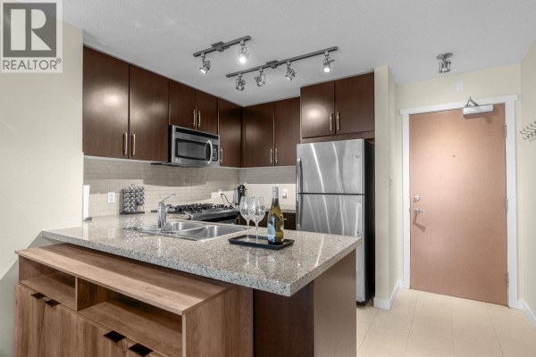 1202 660 Nootka Way, Port Moody, BC V3H0B7 Photo 3