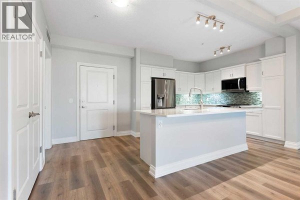 Kitchen - 1208, 10221 Tuscany Boulevard Nw, Calgary, AB T3L0A3 Photo 5