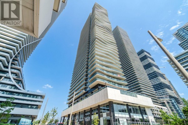 Wide shot of the front of a contemporary skyscraper with a glass base. - 1208 - 33 Shore Breeze Drive, Toronto