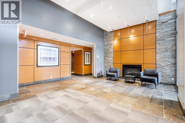 1209 660 Nootka Way, Port Moody, BC V3H0B7 Photo 4