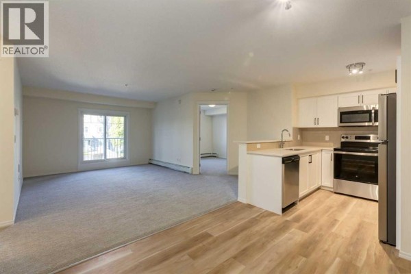 Den - 1210, 115 Prestwick Villas Se, Calgary, AB T2Z0M8 Photo 4