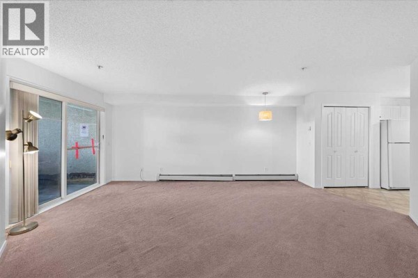 Laundry room - 1210, 8810 Royal Birch Boulevard Nw, Calgary, AB T3G6A9 Photo 4