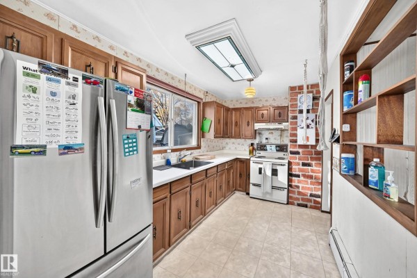 Laundry room - 12110 58 St Nw, Edmonton, AB T5W3X4 Photo 5