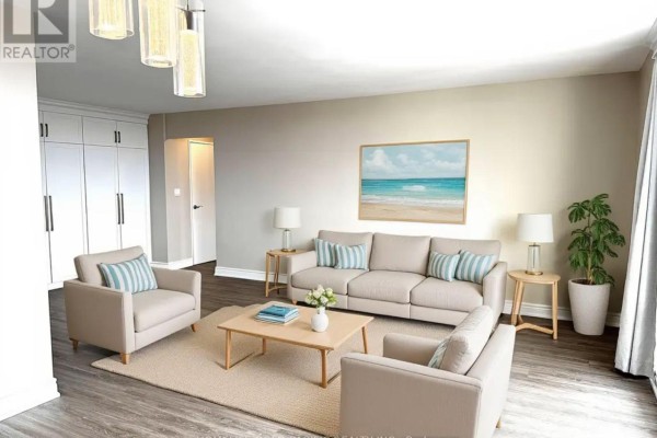 Living room with a beige sofa, two armchairs, a light wood coffee table, and built-in closets. - 1214 - 1 Massey Square, Toronto