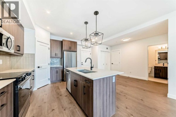 Primary Bedroom - 1217, 14910 1 Street Nw, Calgary, AB T2C3G3 Photo 4