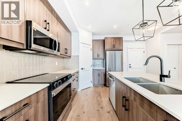 Primary Bedroom - 1217, 14910 1 Street Nw, Calgary, AB T2C3G3 Photo 5