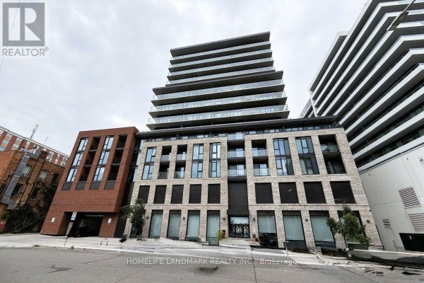 Exterior view of a modern multi-story apartment building with brick and glass facade. - 1217 - 1 Jarvis Street, Hamilton