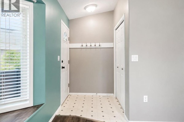 Primary Bedroom - 121a & 121b, 71322 Range Road 262, Ridgevalley, AB T0H0Y0 Photo 2