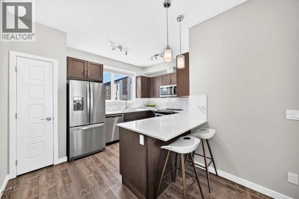 Living room - 122, 301 Redstone Boulevard Ne, Calgary, AB T3N1V7 Photo 4