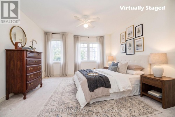 Empty dining area with hardwood floors and view of staircase and hallway. - 1220 Weston Road, Toronto