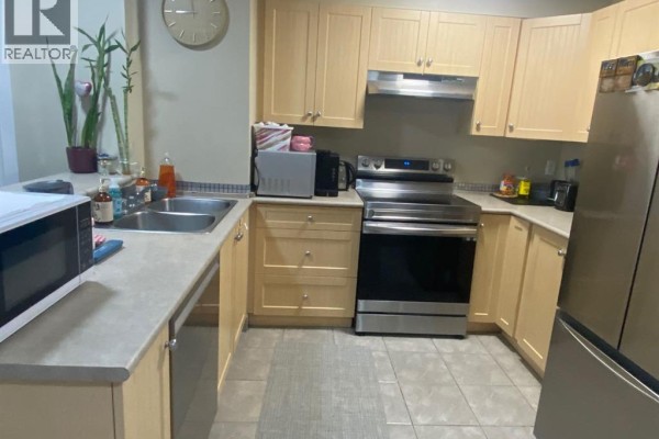 Kitchen - 1221, 60 Panatella Street Nw, Calgary, AB T3K0M1 Photo 3